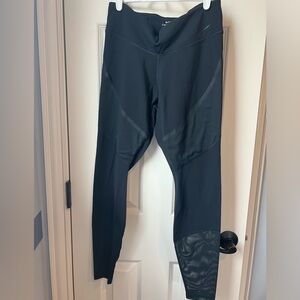 Nike Dri-fit leggings in black with mesh detail